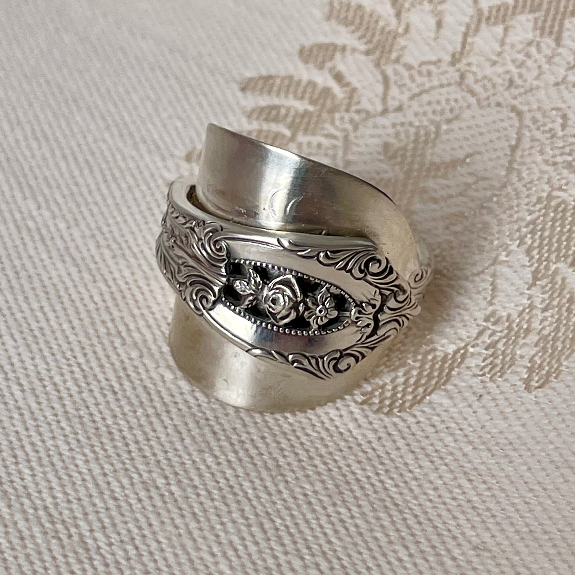A ring made out of a spoon wrapped around itself. 